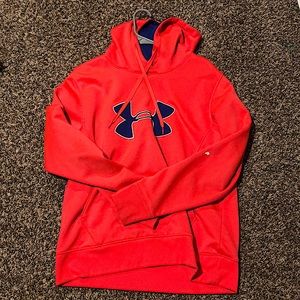 Neon orange/pink with a blue under armor sign.